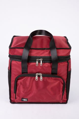 Red insulated cooler bag with black handles and zippers on a white background