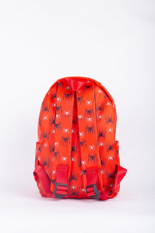 Red backpack with black patterns on a white background